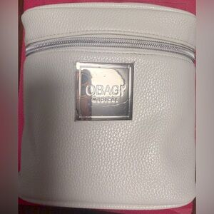 White with Tiffany Blue lined Obagi cosmetics vanity bag